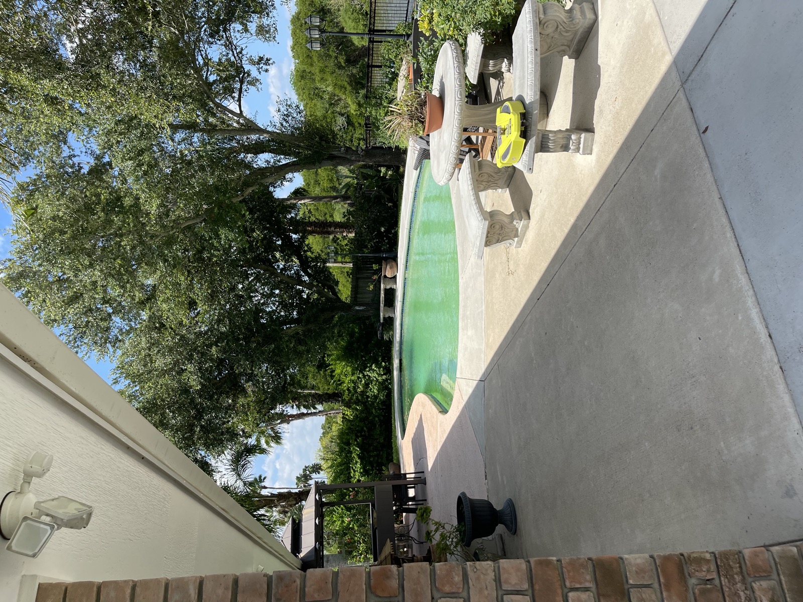 Clean patio with pool area